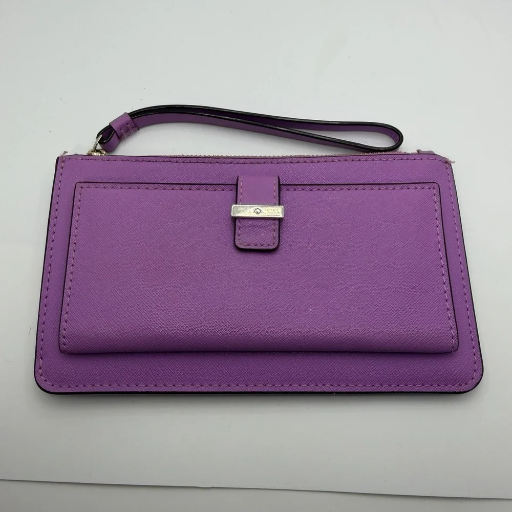 Kate Spade New York purple leather wristlet.